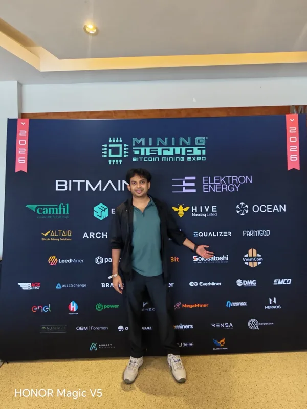 Attendee at the Mining Disrupt event backdrop