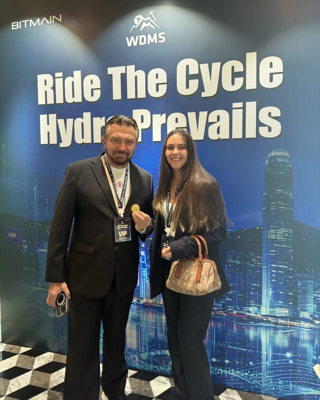 Attendees at the WDMS event backdrop